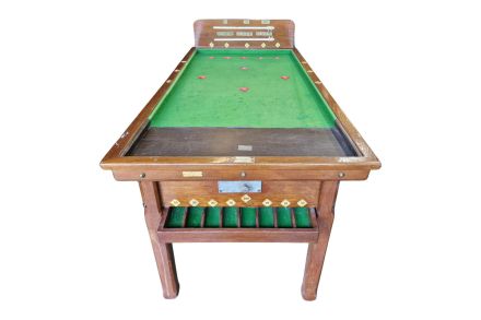 An original oak bar billiard table with original clockwork timer and scoreboard