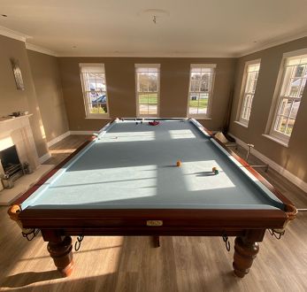 full-size mahogany steel block snooker table