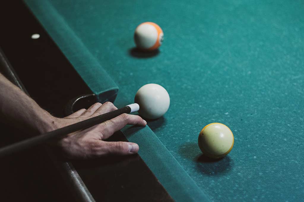 person playing cue sport