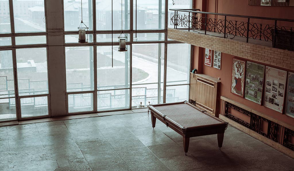 pool table near large windows