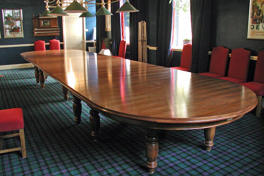 Custom-built extended convertible pool table dining table